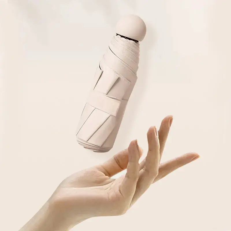 Capsule Umbrella Sunny and Rainy Dualuse Rainproof Wind-resistant Sun Protection Outdoor Traveling Portable Mini Umbrella upscaleclicks