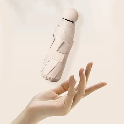 Capsule Umbrella Sunny and Rainy Dualuse Rainproof Wind-resistant Sun Protection Outdoor Traveling Portable Mini Umbrella upscaleclicks